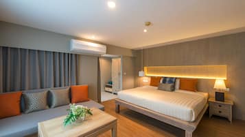 Deluxe Room, Pool View | Pillow-top beds, minibar, in-room safe, desk