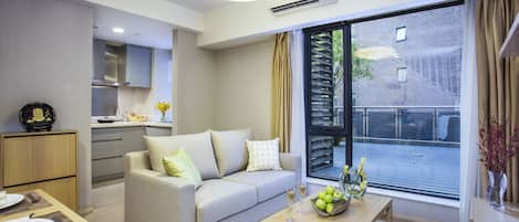 Premium bedding, down duvets, in-room safe, desk