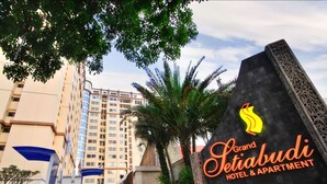 The Grand Setiabudi Hotel & Apartment sign with a modern building in the background. - Grand Setiabudi Hotel (Bandung)