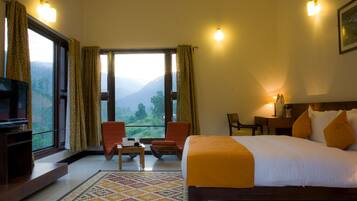 Habitación | Tabla de planchar con plancha y camas extra