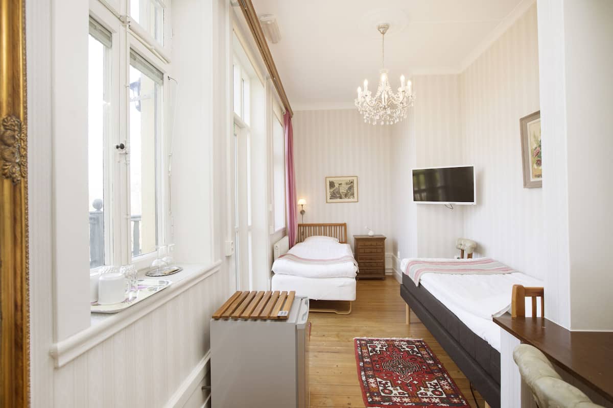 Chambre Triple, vue jardin (Mini) | Vue de la chambre