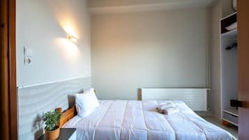 Eenpersoonskamer | Luxe beddengoed, Select Comfort-bedden, een minibar