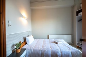 Quarto solteiro | Roupas de cama premium, camas Select Comfort, frigobar