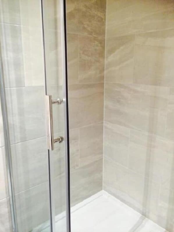 Shower, free toiletries, hair dryer, towels