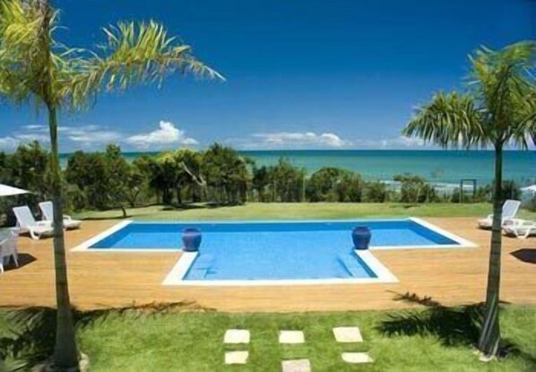 Outdoor pool, pool umbrellas, pool loungers