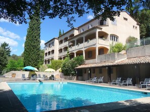 Outdoor pool, pool umbrellas, pool loungers