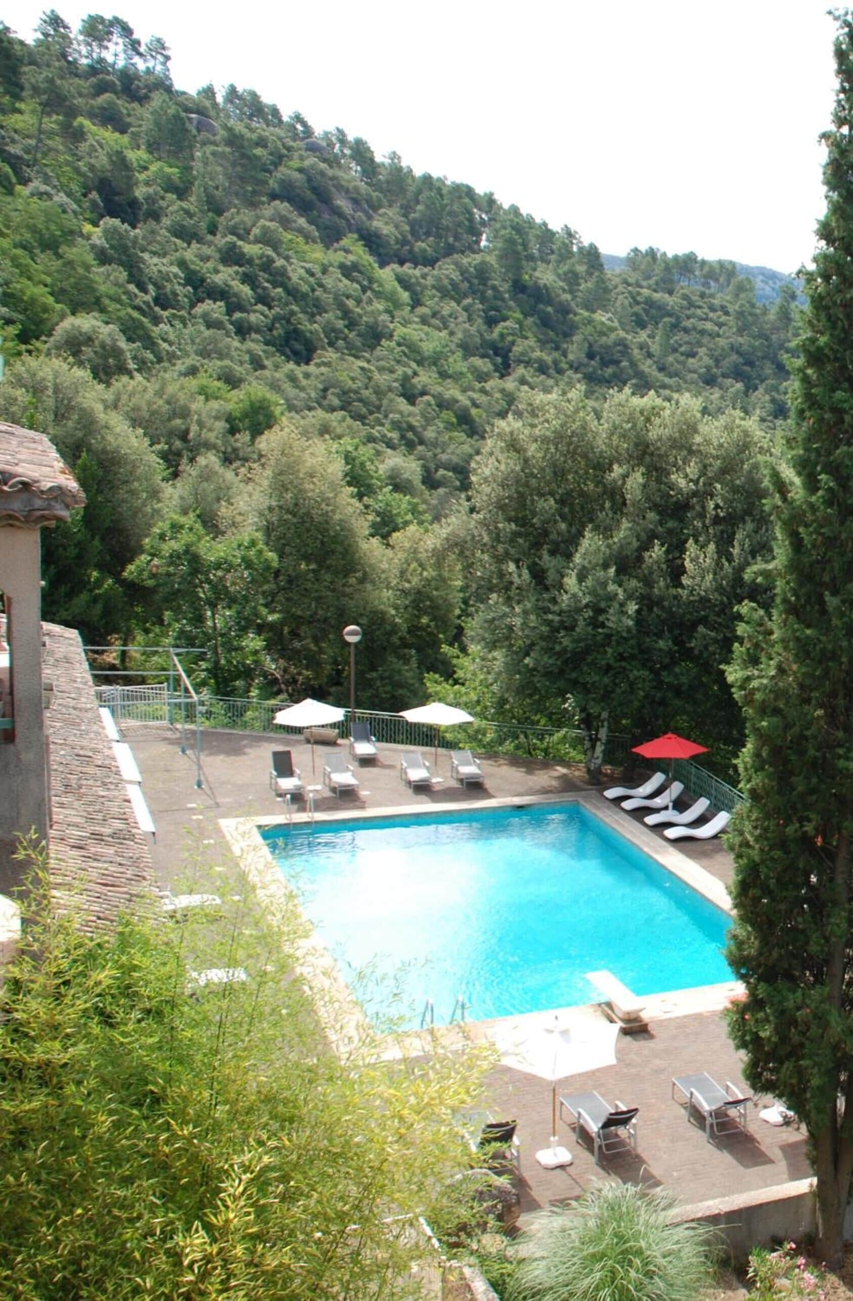 Outdoor pool, pool umbrellas, pool loungers