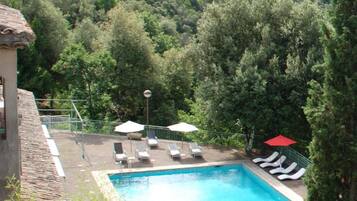 Outdoor pool, pool umbrellas, pool loungers