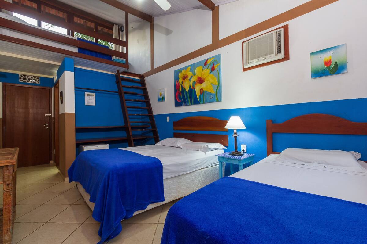 Family Room | 1 bedroom, minibar, WiFi (free), bed sheets