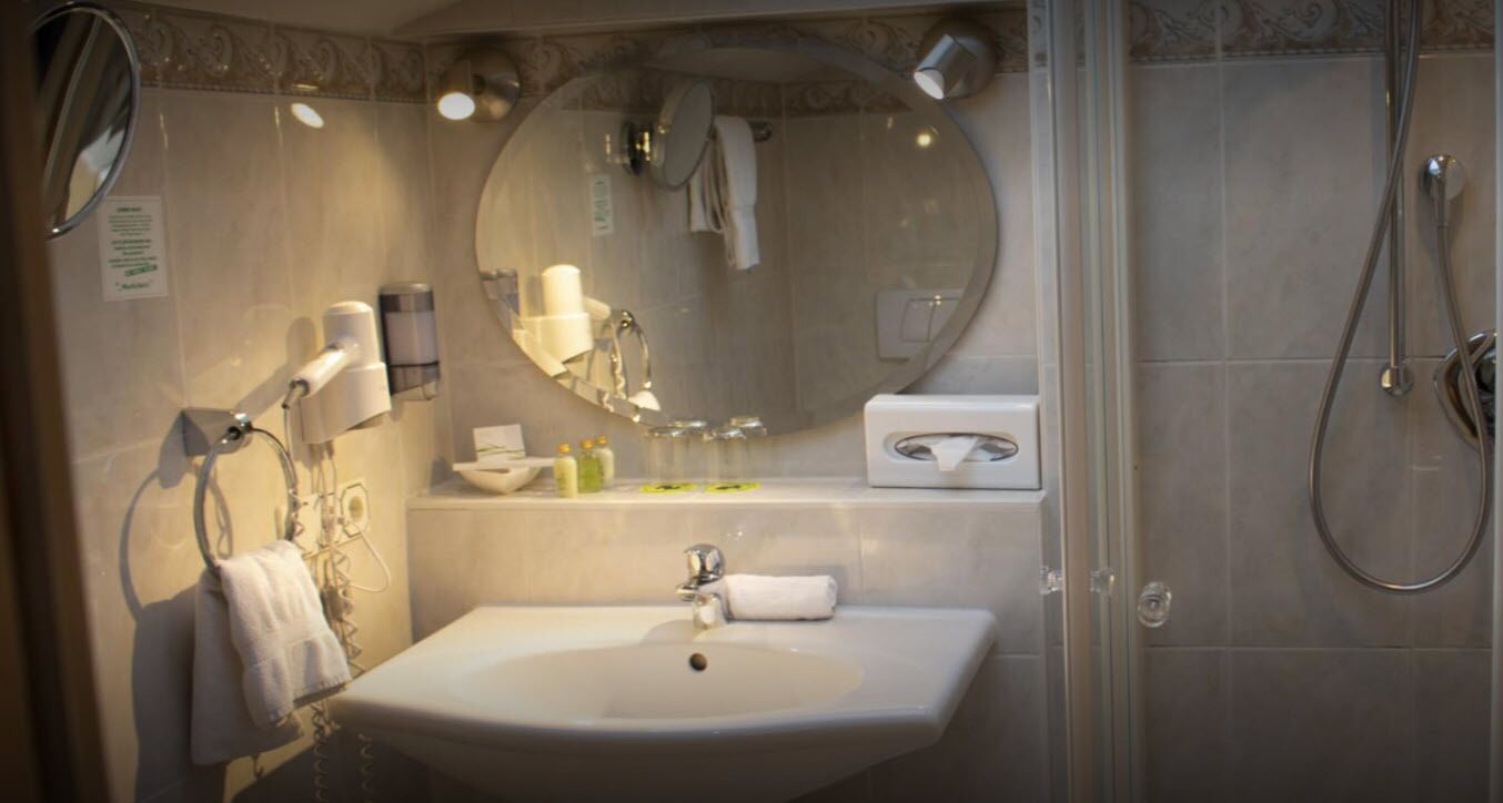 hair dryer, bathrobes, slippers, towels