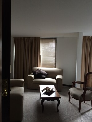 Executive Suite, 1 King Bed, Private Bathroom | 1 bedroom, premium bedding, minibar, in-room safe