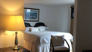 Suite Exécutive, 1 trÚs grand lit, salle de bains privée | 1 chambre, literie de qualité supérieure, minibar