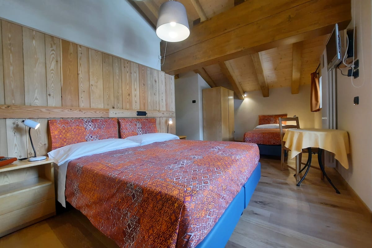 superior triple room | in-room safe, desk, blackout curtains, cots/infant beds