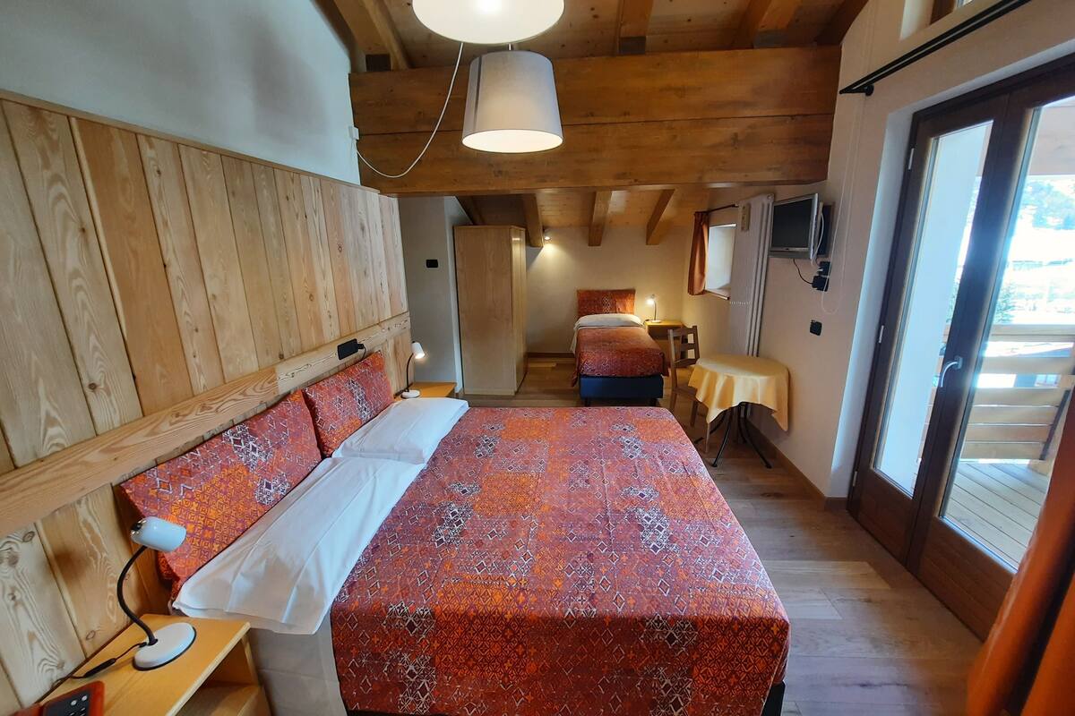 superior triple room | in-room safe, desk, blackout curtains, cots/infant beds