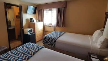 Quartos à prova de som, Wi-Fi de cortesia, roupa de cama