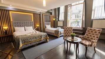 Family Room | Minibar, in-room safe, iron/ironing board, free WiFi