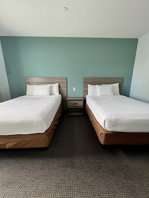 Room, 2 Double Beds, Non Smoking | Desk, iron/ironing board, free wired internet, bed sheets - Americas Best Value Inn Sulphur (Sulphur)