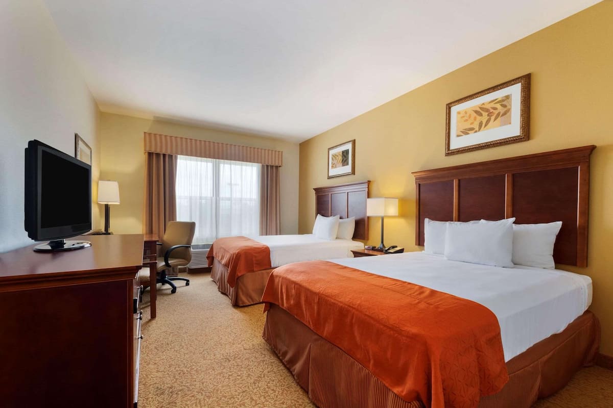 Premium bedding, desk, blackout drapes, iron/ironing board