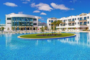 Outdoor pool, pool umbrellas, sun loungers