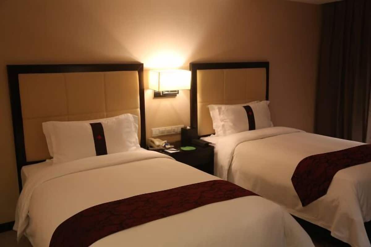 Biancheria da letto di alta qualità, minibar, cassaforte in camera