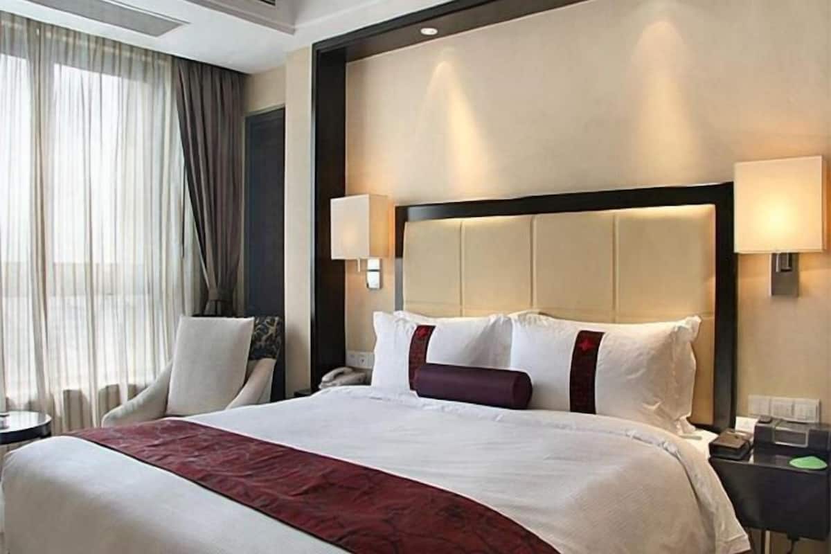 Biancheria da letto di alta qualità, minibar, cassaforte in camera