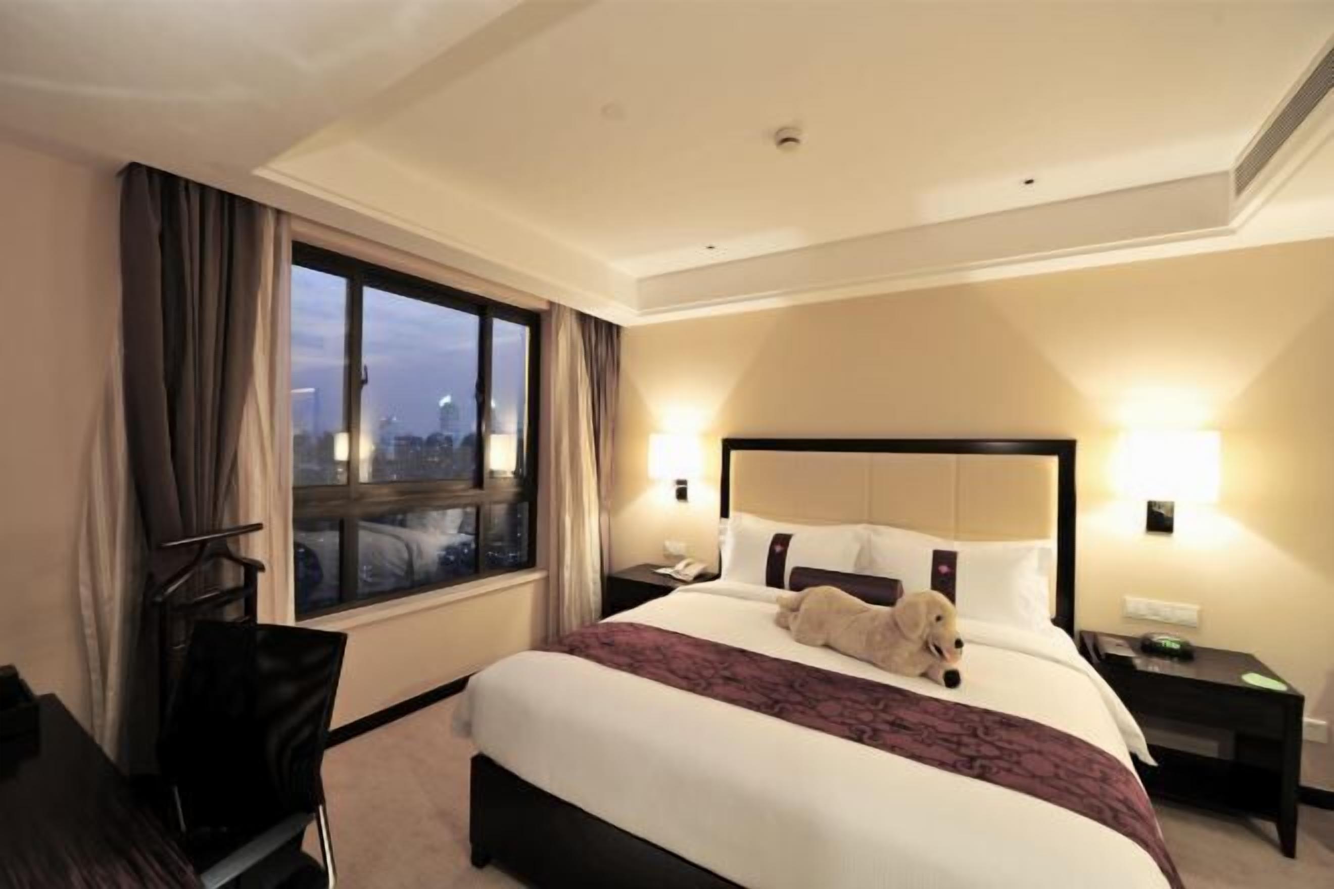 Biancheria da letto di alta qualità, minibar, cassaforte in camera