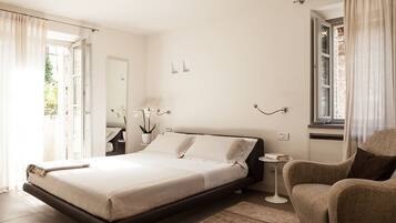 Premium bedding, down duvets, memory-foam beds, minibar