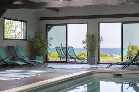 Indoor pool, open 7:00 AM to 10:00 PM, sun loungers