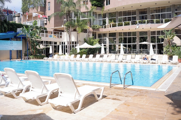 Indoor pool, seasonal outdoor pool, pool umbrellas, pool loungers