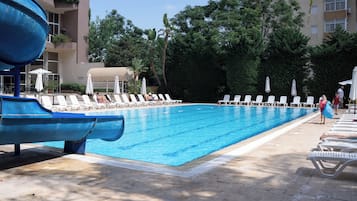 Indoor pool, seasonal outdoor pool, pool umbrellas, pool loungers