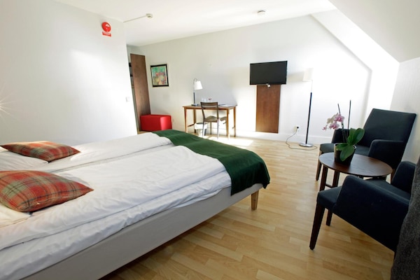 Desk, iron/ironing board, free cots/infant beds, rollaway beds