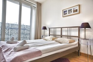 Standaard appartement, 2 slaapkamers | Een strijkplank/strijkijzer, babybedden (toeslag)