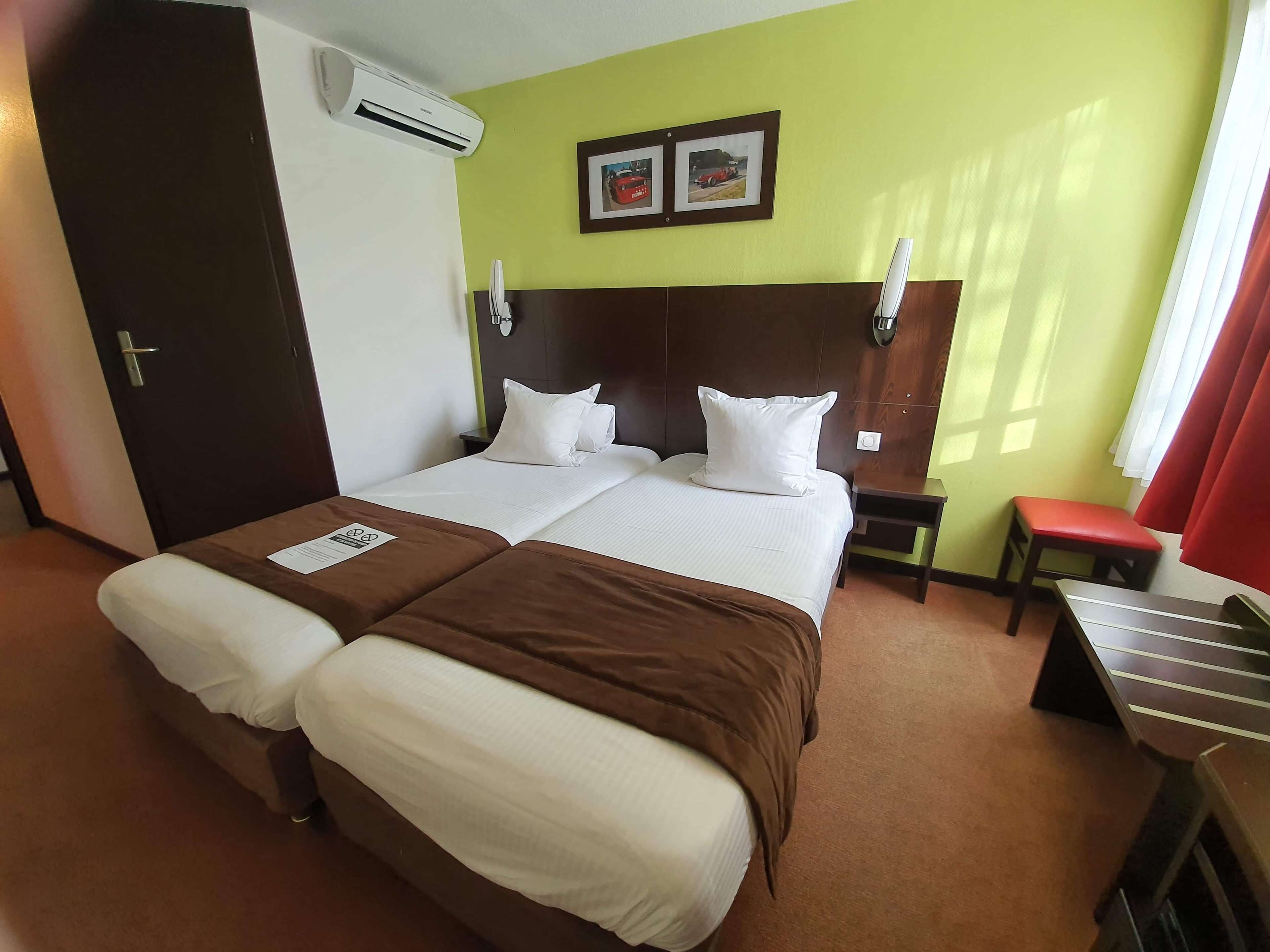standard room, 2 single beds | memory-foam beds, desk, laptop workspace, blackout curtains