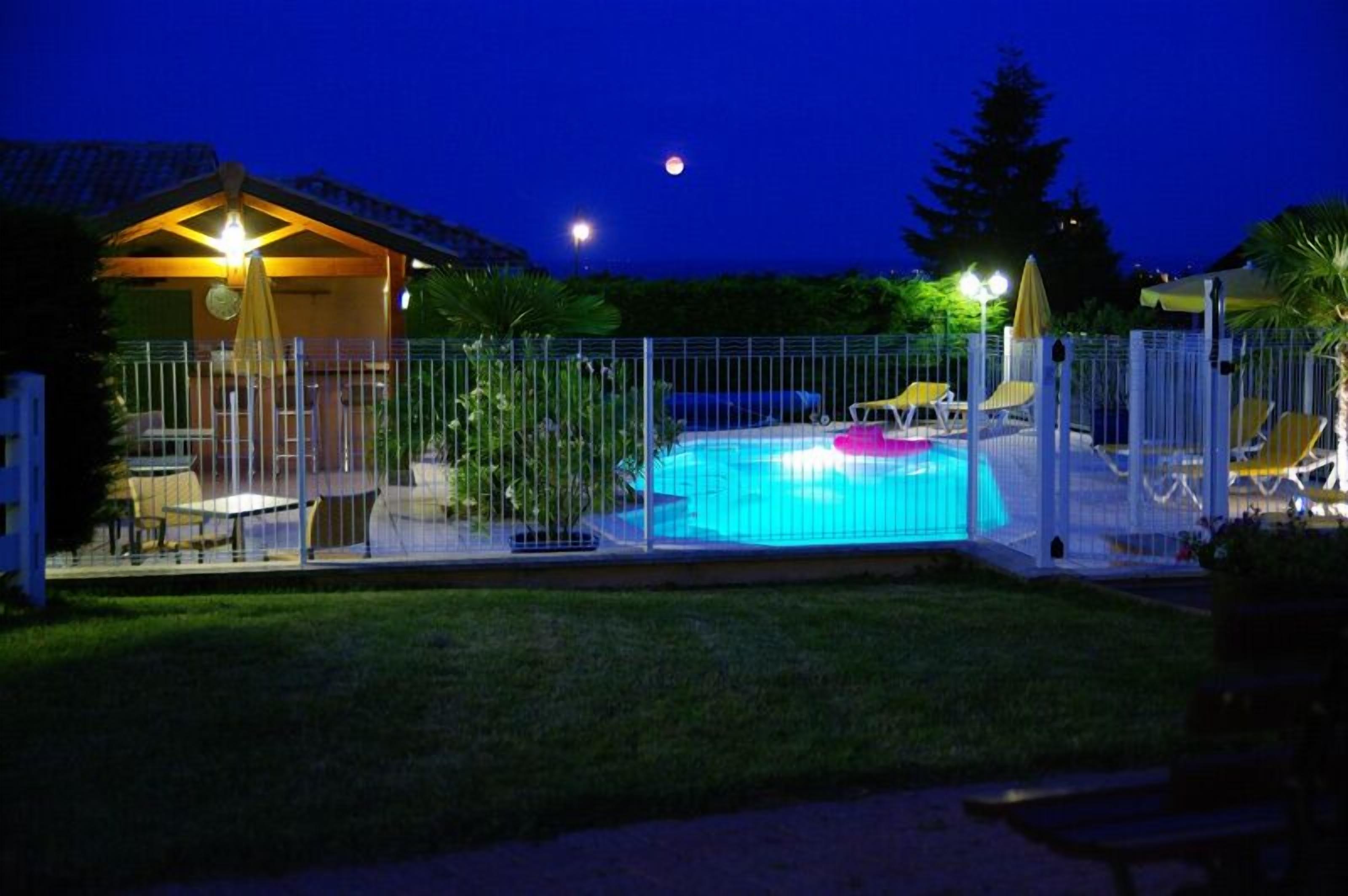 Outdoor pool, open 2:00 PM to 8:00 PM, pool umbrellas, pool loungers