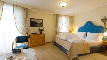 Egyptian cotton sheets, premium bedding, down duvets, minibar