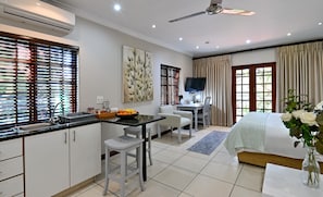 Luxury Room Self-Catering | Premium bedding, minibar, in-room safe, individually decorated - Rivonia Premier Lodge (Johannesburg)