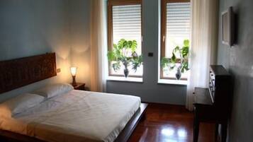 Junior Suite | 1 bedroom, in-room safe, desk, iron/ironing board