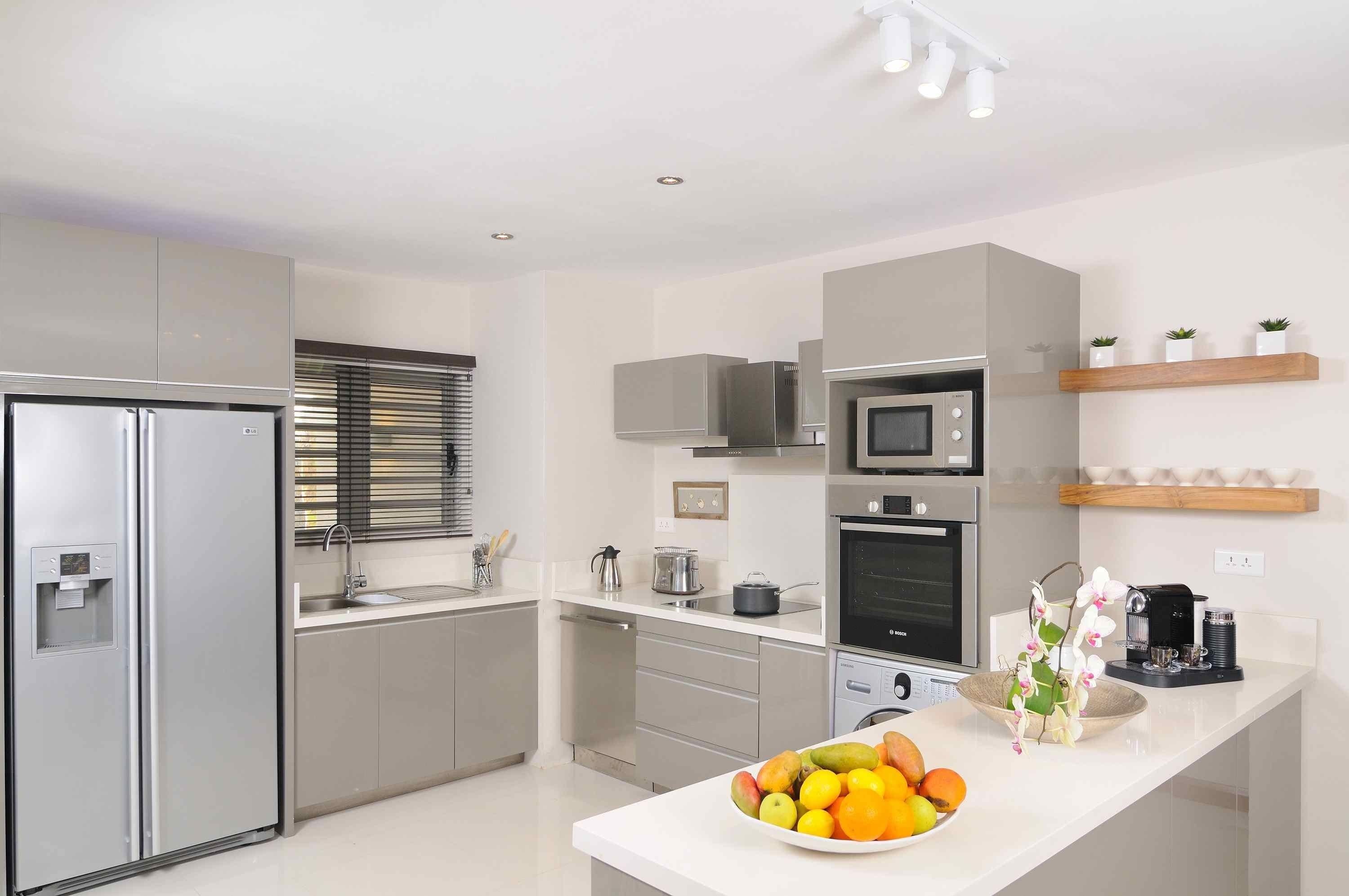 full-sized fridge, microwave, dishwasher, coffee/tea maker