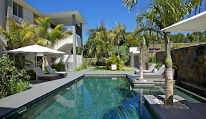 Outdoor pool, pool umbrellas, pool loungers