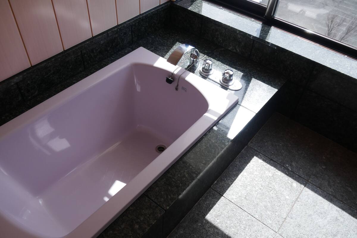 sunset suite | bathroom | free toiletries, hair dryer, slippers, bidet