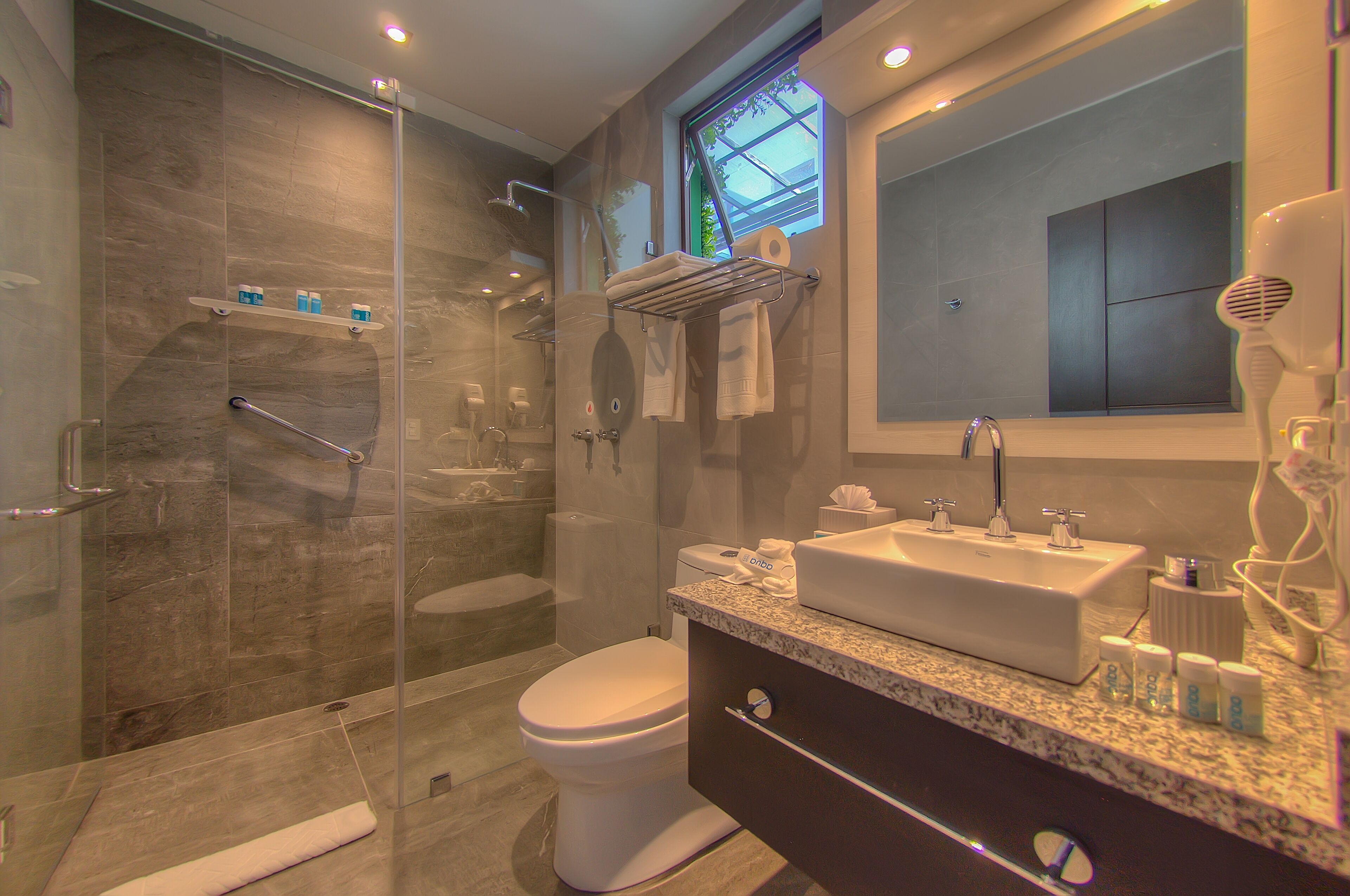 standard double or twin room | bathroom | shower, rainfall showerhead, designer toiletries, hair dryer