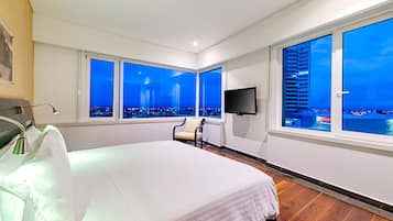 Premium bedding, down comforters, memory foam beds, minibar