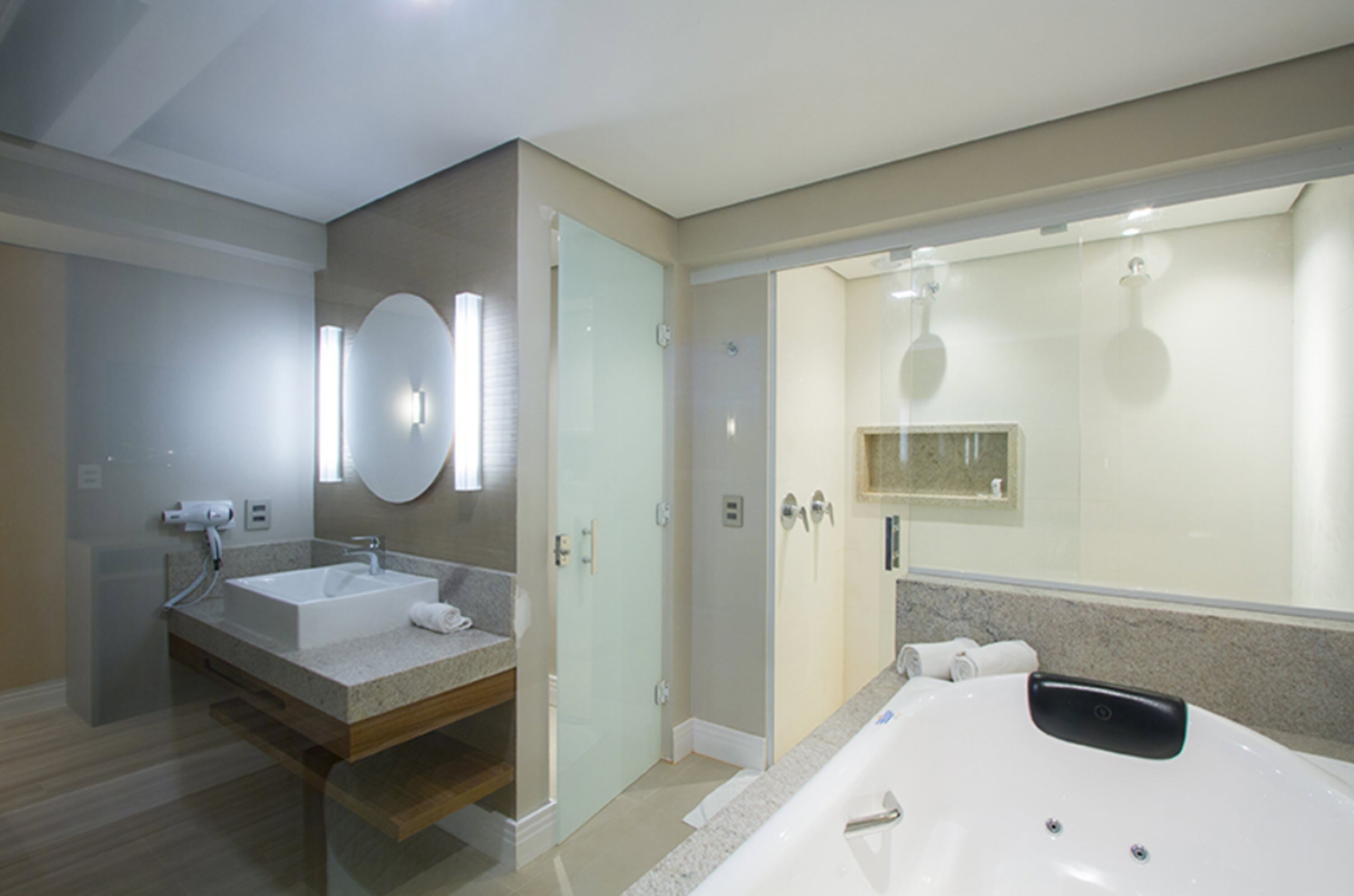 superior suite, 1 king bed, hot tub | bathroom | shower, free toiletries, hair dryer, towels