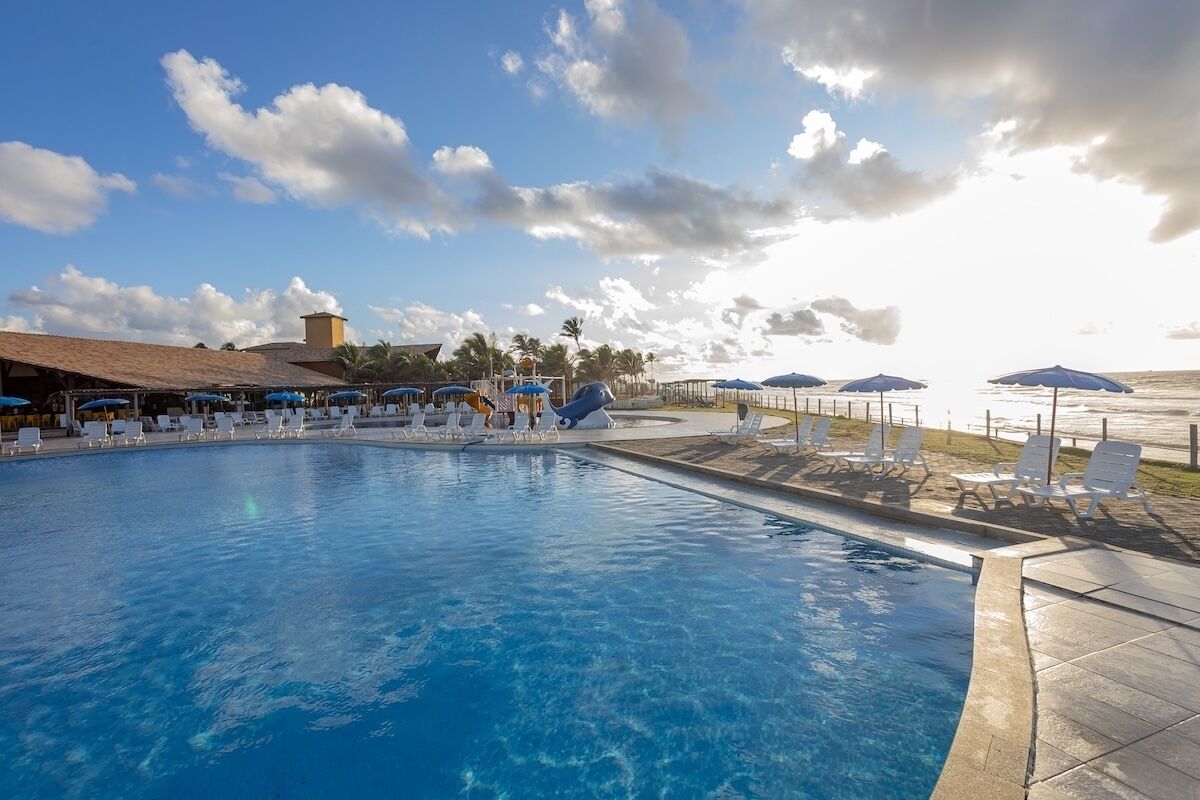 Outdoor pool, pool umbrellas, sun loungers