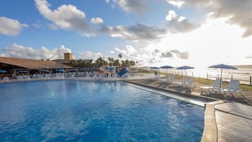 Outdoor pool, pool umbrellas, sun loungers