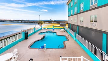 Outdoor pool, open 9 AM to 11 PM, sun loungers