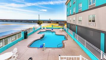 Outdoor pool, open 9 AM to 11 PM, sun loungers