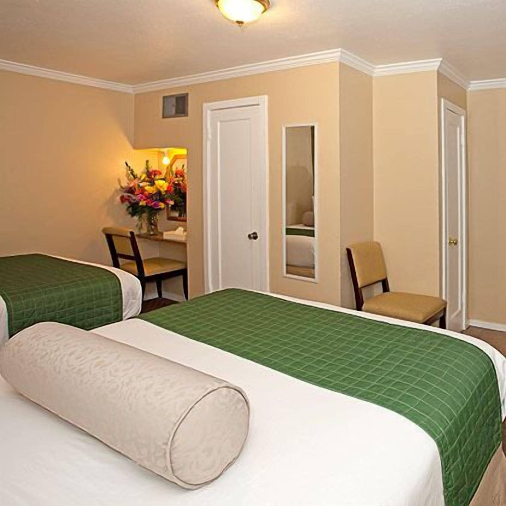 standard room, 1 queen and 1 double bed, non smoking | desk, blackout curtains, soundproofing, iron/ironing board