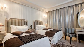 Hypo-allergenic bedding, memory-foam beds, minibar, in-room safe