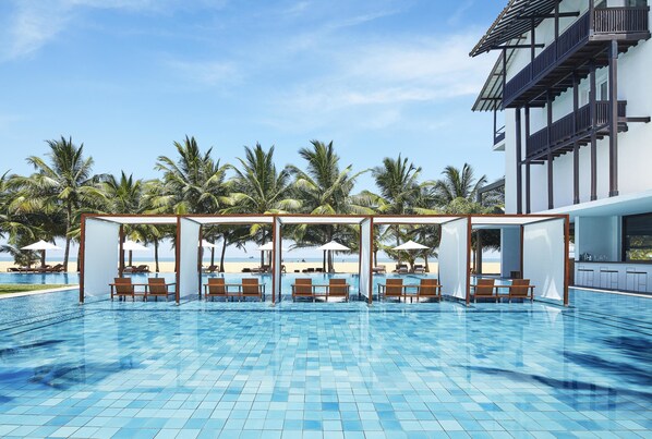 2 outdoor pools, pool umbrellas, sun loungers